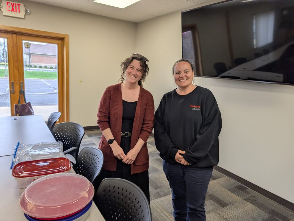 2 LOSS Team members smiling