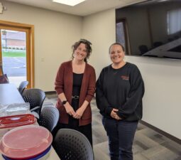 2 LOSS Team members smiling